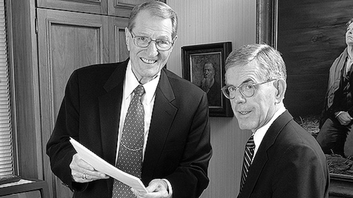 Elder Neal A. Maxwell standing next to his biographer, Elder Bruce C. Hafen.